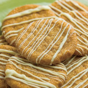 Gingersnap cookies with white chocolate drizzle recipe
