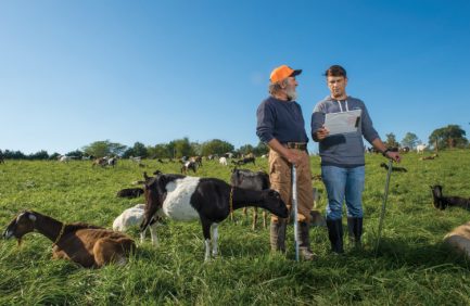 Kyle Mead (right) of the Van Buren Conservation District works with Windshadow Farm & Dairy owner Ron Klein to create a customized plan for increased sustainability.