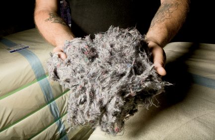 Larry Hobbs, left, and his family’s company, Hobbs Bonded Fibers in Waco, create innovative products like insultion for cars from cotton and other natural fibers.