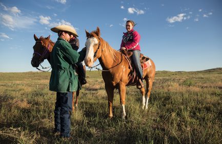 Tyler talks with Sandi and Paige Turecek as they round up part of the herd of Beef cattle out on the range. Stacked Lazy 3 Ranch is a diversified enterprise with a commercial cow/calf herd, as well as dry-land crops. The Tureceks have worked diligently to convert hundreds of acres of marginal farm ground back to native grass pasture earning the the 2016 Leoplod Conservation Award.