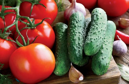 Fresh vegetables with herbs and spices on table, close-up