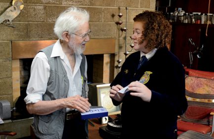 Bayli Hyde, reporter for the Burlington FFA chapter in Oklahoma, interviews Jackson Tiffany, son of E.M Tiffany who authored the FFA Creed.