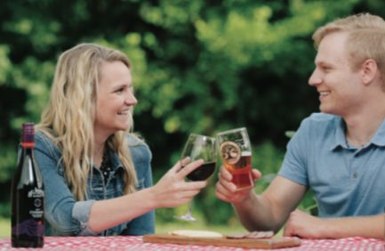 COUPLE CHEERS WINE