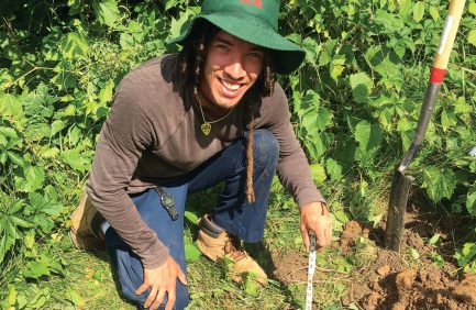 Devin Martinez-Orengo conducts a soil investigation as part of the Pathways Internship Program with the NRCS.