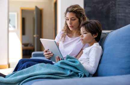 Mother and her sick son talking to the doctor on a telemedicine call thanks to the Texas Rural Hospital Broadband Infrastructure Program