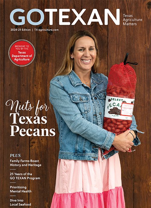 Go Texan Cover 2024 - lady holding pecans