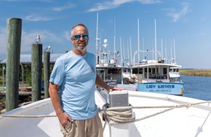 Steve Rash, Water Street Seafood owner, on a fishing boat