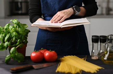 person reading cookbook